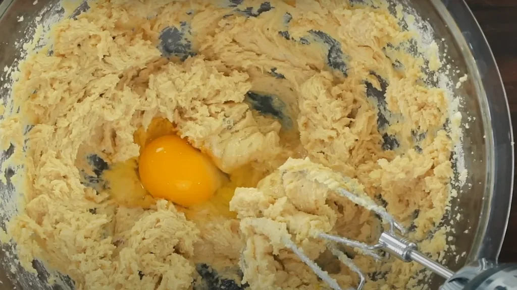 Adding the Eggs to the Butter and Sugar Mixture