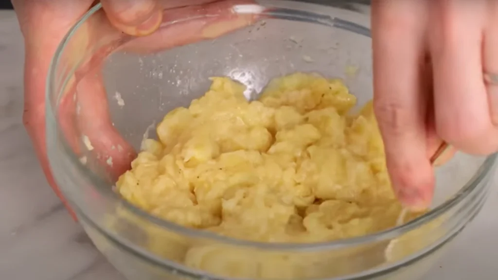 Mashing Banana for Banana Bread Recipe