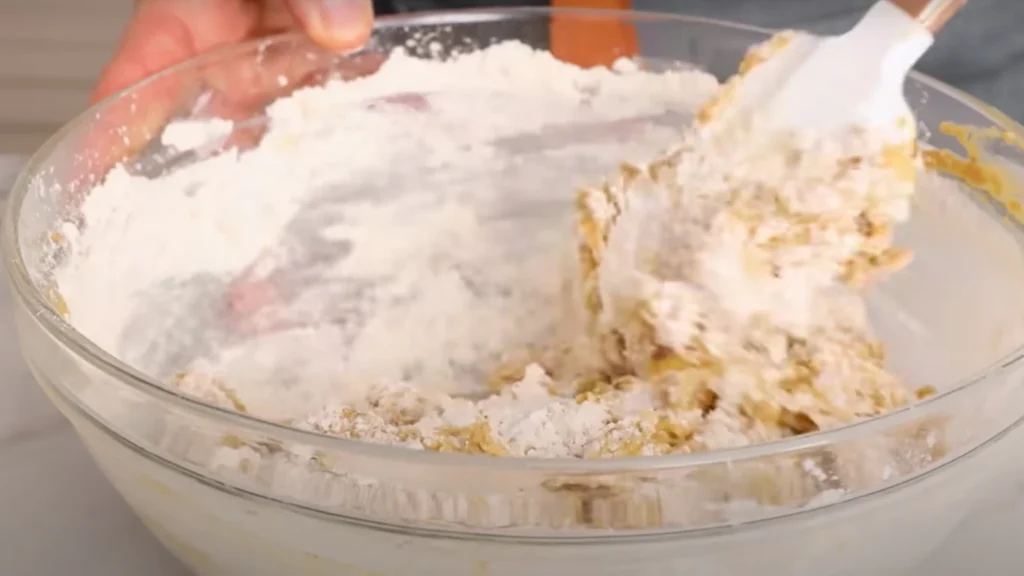Mixing Banana and Dry Ingredient for Banana Bread Recipe