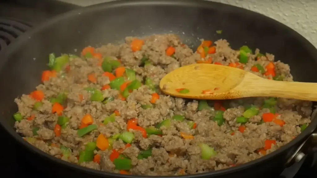 Adding green bell and red ball pepper