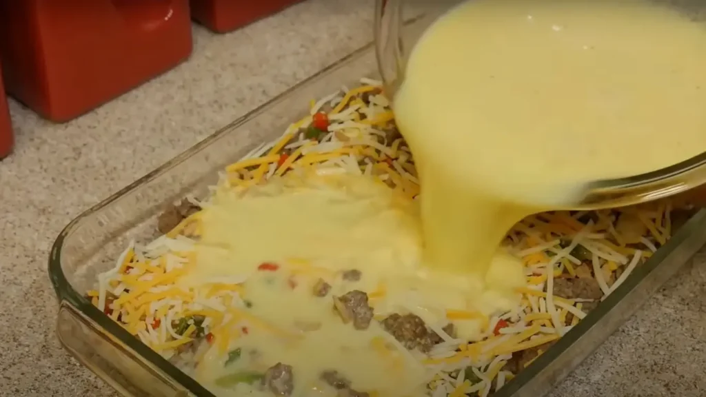 Pouring the Eggs In Casserole Recipe